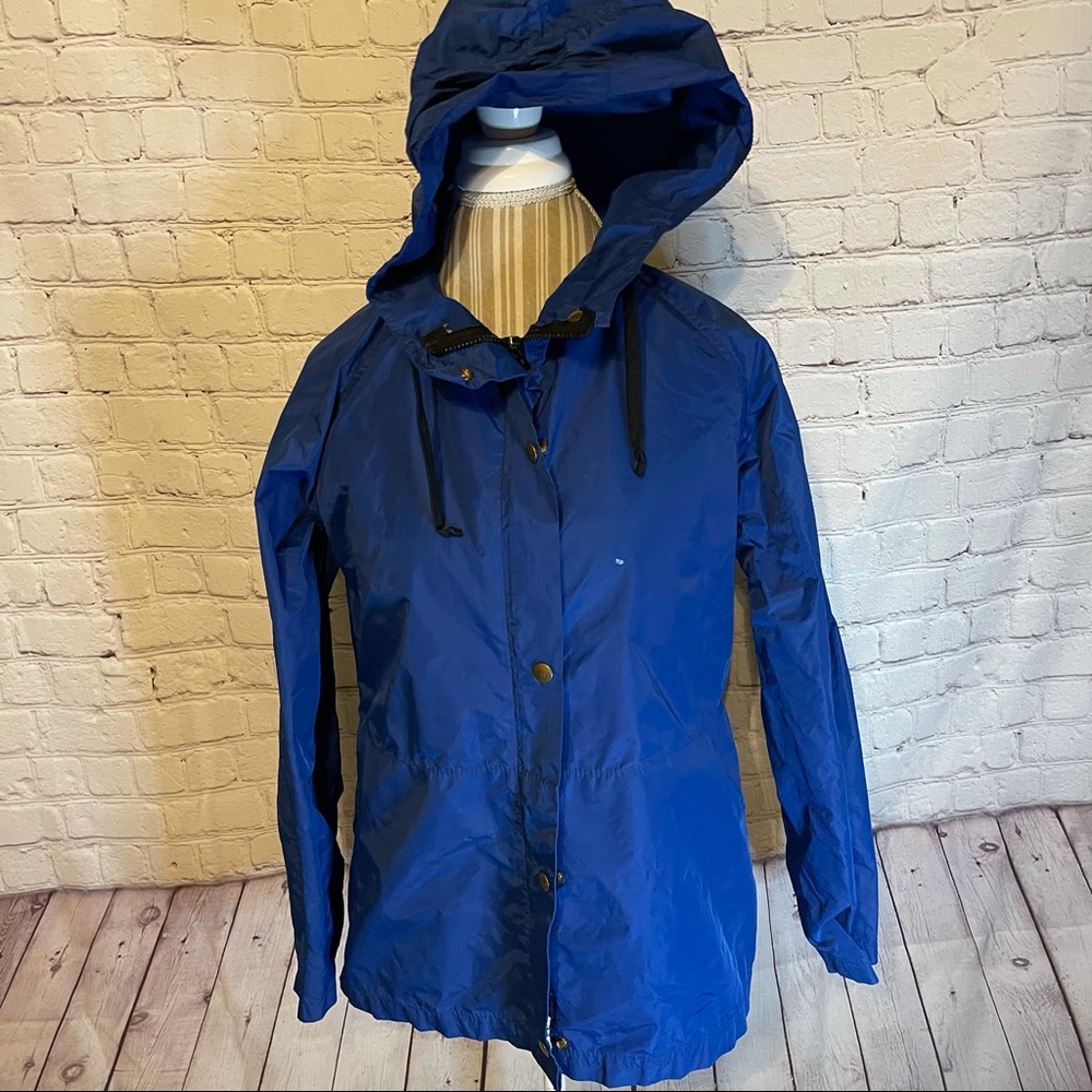 R.E.I. Blue windbreaker, 14
